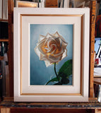 White rose in white frame with gold slip